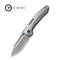 WEKNIFE Micro Trogon Thumb Stud Knife Satin Polished Titanium Handle with Blue Holes (2.68" Polished Bead Blasted Bohler M390 Blade) WE24043 Sample1