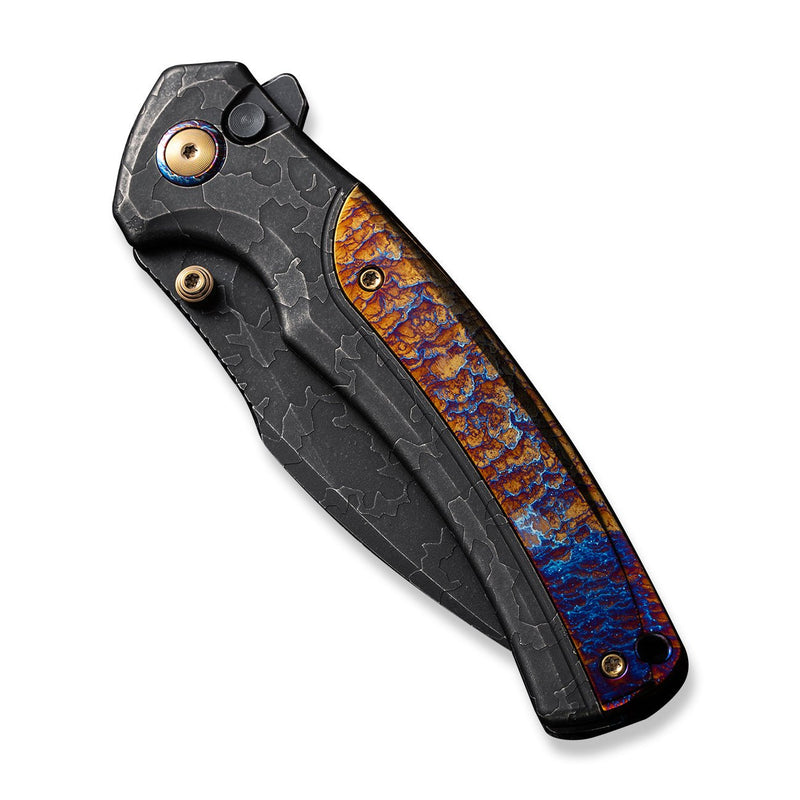 https://www.weknife.com/cdn/shop/products/weknife-ziffius-button-lock-thumb-stud-knife-black-stonewashed-with-etching-pattern-titanium-handle-with-flamed-titanium-integral-spacer-37-black-stonewashed-wi-253281_800x.jpg?v=1693549707